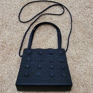Navy purse w floral and beading details
